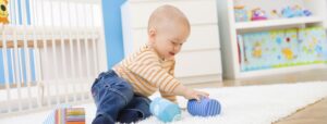 healthy baby playing